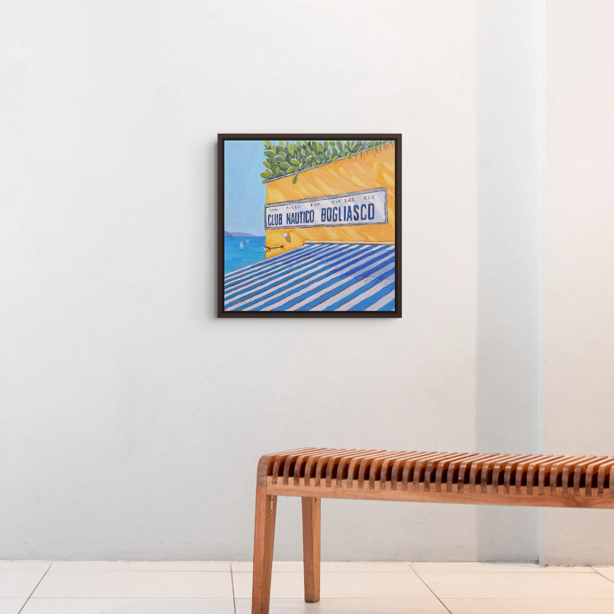 A gallery setting showing the colorful Mediterranean themed canvas print, Club Nautico by Artglober.