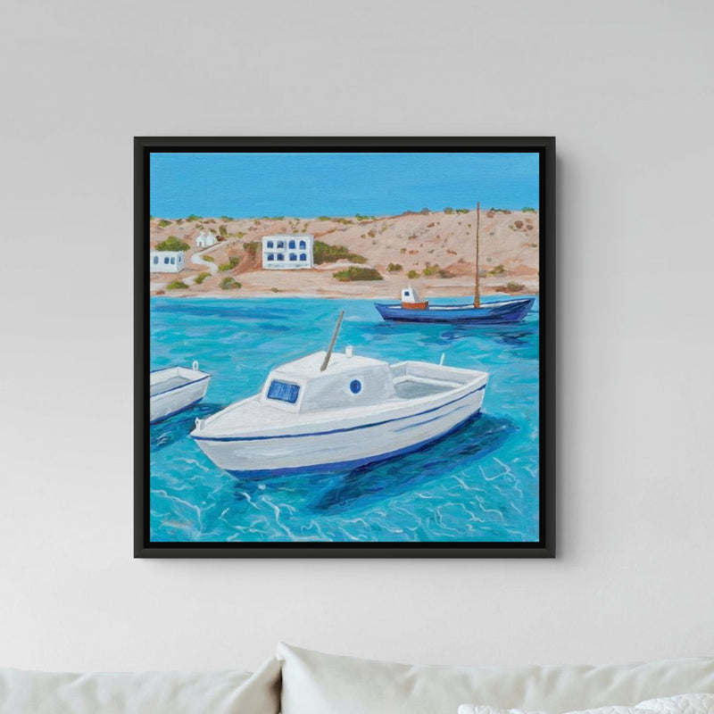 A colorful framed print of "The Mightiest Little Fishing Boat" by Artglober captures coastal Greece.